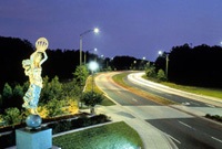 nighttime view of the gateway intersection and one of the civitas statues